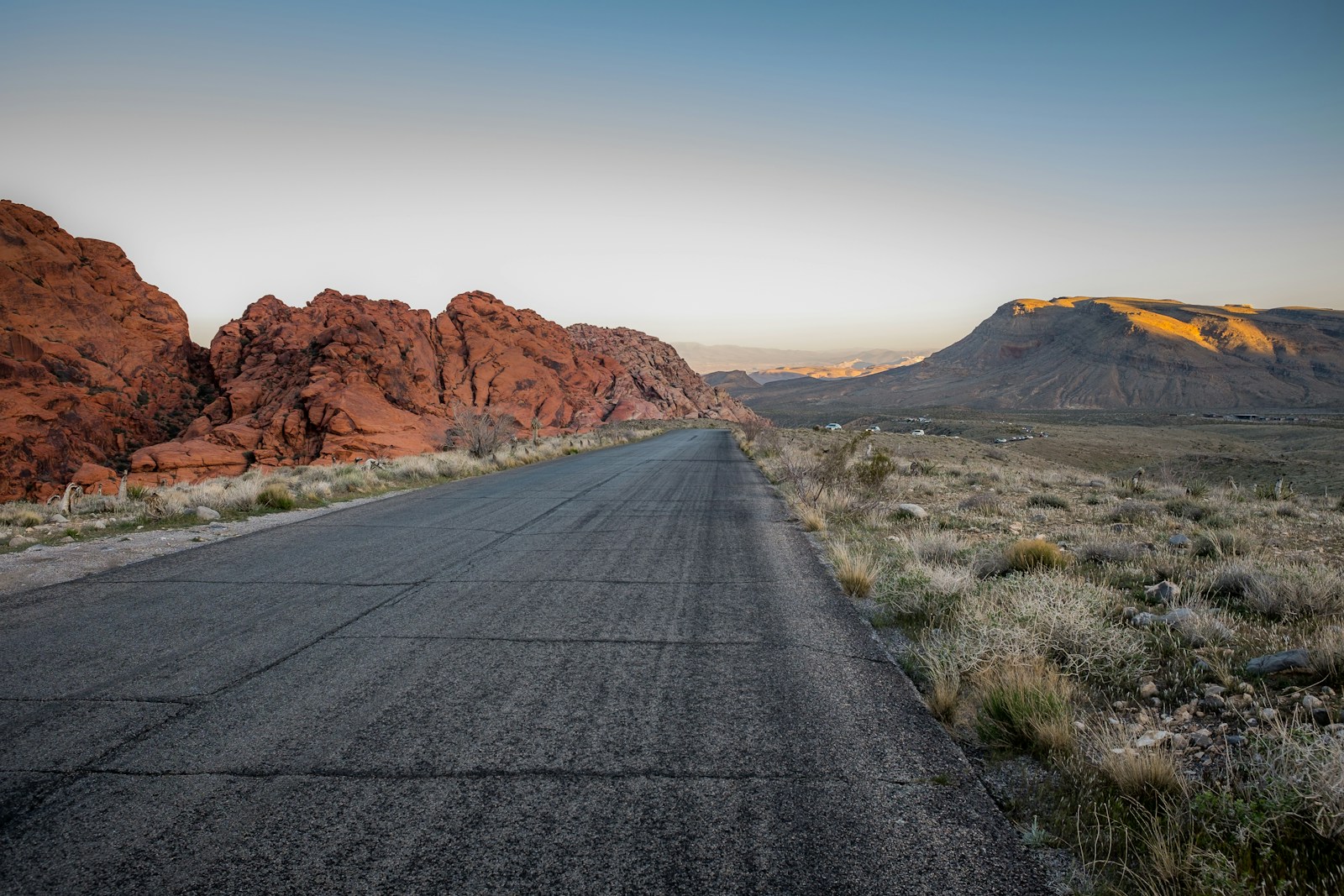 A rental car on the red rock loop road at golden hour